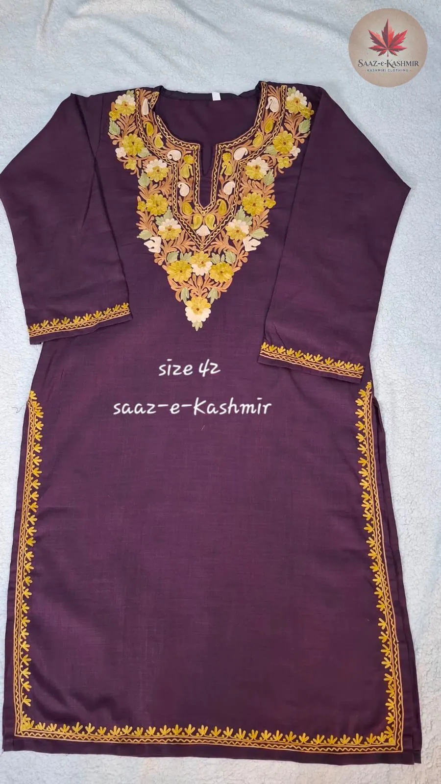 Handcrafted purple silk suit featuring traditional Kashmiri design work